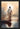 Gabriel Heaton painting of Jesus Christ seen from behind walking into brilliant white light reflected in calm water surrounded by dramatic clouds