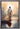 Gabriel Heaton painting of Jesus Christ seen from behind walking into brilliant white light reflected in calm water surrounded by dramatic clouds