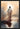 Gabriel Heaton painting of Jesus Christ seen from behind walking into brilliant white light reflected in calm water surrounded by dramatic clouds