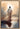 Gabriel Heaton painting of Jesus Christ seen from behind walking into brilliant white light reflected in calm water surrounded by dramatic clouds