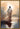 Gabriel Heaton painting of Jesus Christ seen from behind walking into brilliant white light reflected in calm water surrounded by dramatic clouds