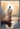 Gabriel Heaton painting of Jesus Christ seen from behind walking into brilliant white light reflected in calm water surrounded by dramatic clouds