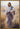 Gabriel Heaton painting of Jesus Christ in white robes carrying a white lamb through a golden wheat field