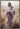 Gabriel Heaton painting of Jesus Christ in white robes carrying a white lamb through a golden wheat field