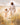 Gabriel Heaton painting of Jesus Christ in white robes walking hand in hand with a young girl through a golden wheat field