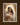 Gabriel Heaton painting of the Virgin Mary in white robes with a soft halo tenderly holding the newborn baby Jesus swaddled in white cloth