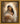 Gabriel Heaton painting of the Virgin Mary in white robes with a soft halo tenderly holding the newborn baby Jesus swaddled in white cloth