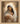 Gabriel Heaton painting of the Virgin Mary in white robes with a soft halo tenderly holding the newborn baby Jesus swaddled in white cloth