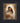 Gabriel Heaton painting of the Virgin Mary in white robes with a soft halo tenderly holding the newborn baby Jesus swaddled in white cloth