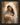 Gabriel Heaton painting of the Virgin Mary in white robes with a soft halo tenderly holding the newborn baby Jesus swaddled in white cloth