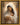Gabriel Heaton painting of the Virgin Mary in white robes with a soft halo tenderly holding the newborn baby Jesus swaddled in white cloth