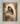 Gabriel Heaton painting of the Virgin Mary in white robes with a soft halo tenderly holding the newborn baby Jesus swaddled in white cloth