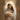 Gabriel Heaton painting of the Virgin Mary in white robes with a soft halo tenderly holding the newborn baby Jesus swaddled in white cloth