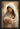 Gabriel Heaton painting of the Virgin Mary in white robes with a soft halo tenderly holding the newborn baby Jesus swaddled in white cloth