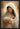 Gabriel Heaton painting of the Virgin Mary in white robes with a soft halo tenderly holding the newborn baby Jesus swaddled in white cloth