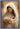 Gabriel Heaton painting of the Virgin Mary in white robes with a soft halo tenderly holding the newborn baby Jesus swaddled in white cloth