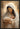 Gabriel Heaton painting of the Virgin Mary in white robes with a soft halo tenderly holding the newborn baby Jesus swaddled in white cloth