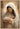 Gabriel Heaton painting of the Virgin Mary in white robes with a soft halo tenderly holding the newborn baby Jesus swaddled in white cloth