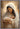 Gabriel Heaton painting of the Virgin Mary in white robes with a soft halo tenderly holding the newborn baby Jesus swaddled in white cloth