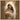 Gabriel Heaton painting of the Virgin Mary in white robes with a soft halo tenderly holding the newborn baby Jesus swaddled in white cloth