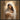 Gabriel Heaton painting of the Virgin Mary in white robes with a soft halo tenderly holding the newborn baby Jesus swaddled in white cloth