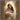 Gabriel Heaton painting of the Virgin Mary in white robes with a soft halo tenderly holding the newborn baby Jesus swaddled in white cloth