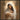 Gabriel Heaton painting of the Virgin Mary in white robes with a soft halo tenderly holding the newborn baby Jesus swaddled in white cloth