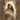 Gabriel Heaton painting of the Virgin Mary in white robes with a soft halo tenderly holding the newborn baby Jesus swaddled in white cloth