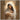 Gabriel Heaton painting of the Virgin Mary in white robes with a soft halo tenderly holding the newborn baby Jesus swaddled in white cloth