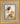 Gabriel Heaton painting of Jesus Christ in white robes tenderly holding a small white lamb close to his chest with a gentle loving expression