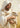 Gabriel Heaton painting of Jesus Christ in white robes tenderly holding a small white lamb close to his chest with a gentle loving expression