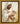 Gabriel Heaton painting of Jesus Christ in white robes tenderly holding a small white lamb close to his chest with a gentle loving expression