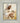 Gabriel Heaton painting of Jesus Christ in white robes tenderly holding a small white lamb close to his chest with a gentle loving expression