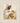 Gabriel Heaton painting of Jesus Christ in white robes tenderly holding a small white lamb close to his chest with a gentle loving expression