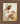 Gabriel Heaton painting of Jesus Christ in white robes tenderly holding a small white lamb close to his chest with a gentle loving expression