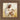 Gabriel Heaton painting of Jesus Christ in white robes tenderly holding a small white lamb close to his chest with a gentle loving expression