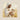 Gabriel Heaton painting of Jesus Christ in white robes tenderly holding a small white lamb close to his chest with a gentle loving expression