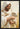 Gabriel Heaton painting of Jesus Christ in white robes tenderly holding a small white lamb close to his chest with a gentle loving expression