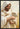 Gabriel Heaton painting of Jesus Christ in white robes tenderly holding a small white lamb close to his chest with a gentle loving expression
