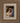 Gabriel Heaton painting of Joseph and Mary cradling the newborn baby Jesus in a warm, intimate nativity scene