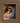 Gabriel Heaton painting of Joseph and Mary cradling the newborn baby Jesus in a warm, intimate nativity scene