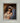Gabriel Heaton painting of Joseph and Mary cradling the newborn baby Jesus in a warm, intimate nativity scene