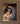 Gabriel Heaton painting of Joseph and Mary cradling the newborn baby Jesus in a warm, intimate nativity scene