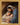 Gabriel Heaton painting of Joseph and Mary cradling the newborn baby Jesus in a warm, intimate nativity scene