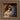 Gabriel Heaton painting of Joseph and Mary cradling the newborn baby Jesus in a warm, intimate nativity scene