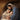 Gabriel Heaton painting of Joseph and Mary cradling the newborn baby Jesus in a warm, intimate nativity scene