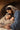 Gabriel Heaton painting of Joseph and Mary cradling the newborn baby Jesus in a warm, intimate nativity scene