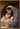 Gabriel Heaton painting of Joseph and Mary cradling the newborn baby Jesus in a warm, intimate nativity scene