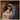 Gabriel Heaton painting of Joseph and Mary cradling the newborn baby Jesus in a warm, intimate nativity scene