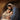 Gabriel Heaton painting of Joseph and Mary cradling the newborn baby Jesus in a warm, intimate nativity scene